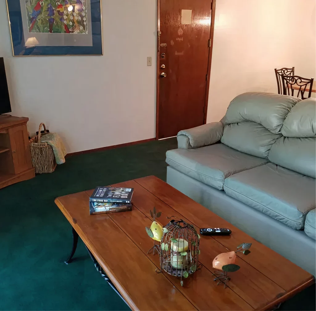 Apartment living room interior at Walnut Gardens Apartments