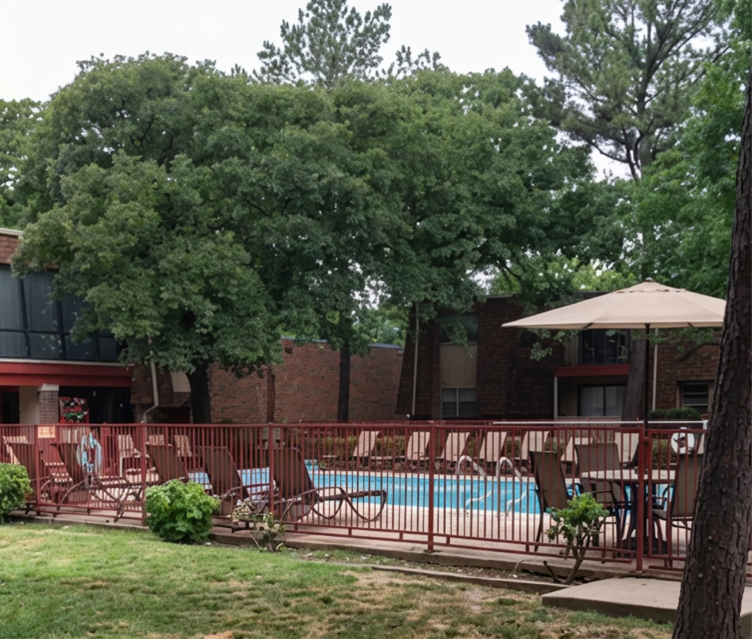Outdoor swimming pool at Walnut Gardens Apartments in Oklahoma City