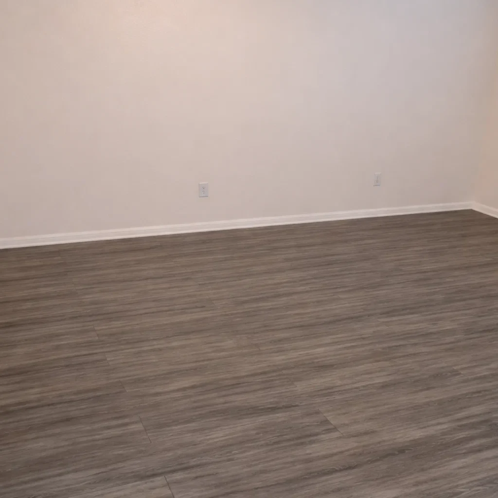 Modern Wood-Style Flooring at La Villa Elms Modern wood-style flooring and fresh white walls inside the La Villa Elms Apartments living space.
